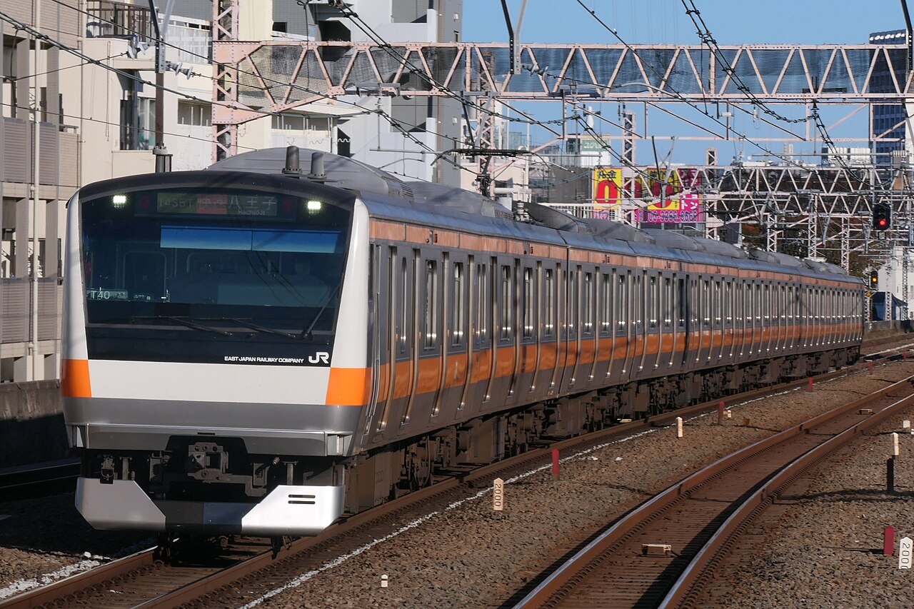 JR East E233-0 series set T40 on a rapid service to Hachiōji, between Ogikubo and Nishi-Ogikubo on the Chūō Line (Rapid).