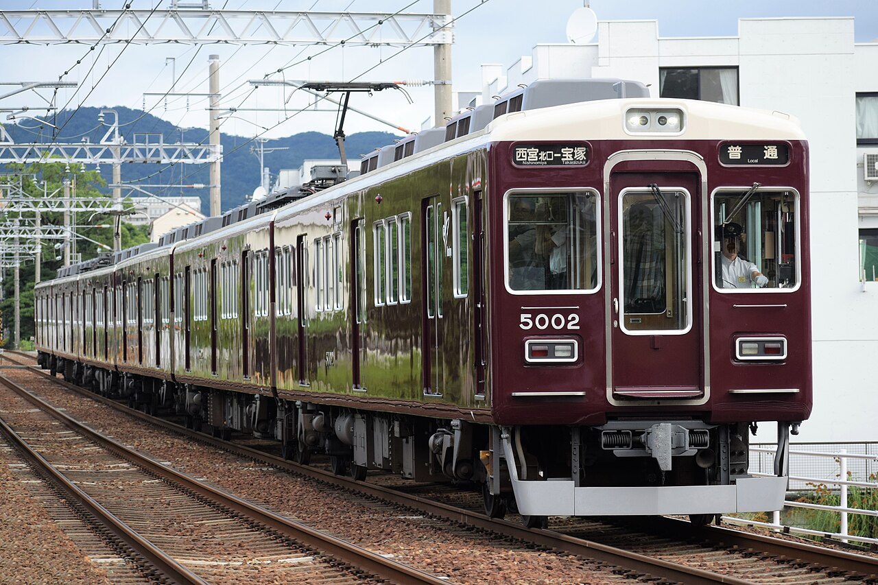 A Hankyu 5000-series train on the Imazu Line between Sakasegawa and Kobayashi stations.