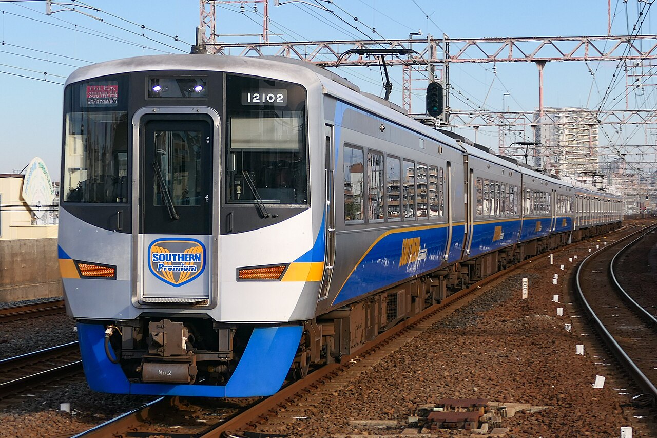 A 12000 series 'Southern' express bound for Wakayama Port passing Kohama Station on the Nankai Main Line.