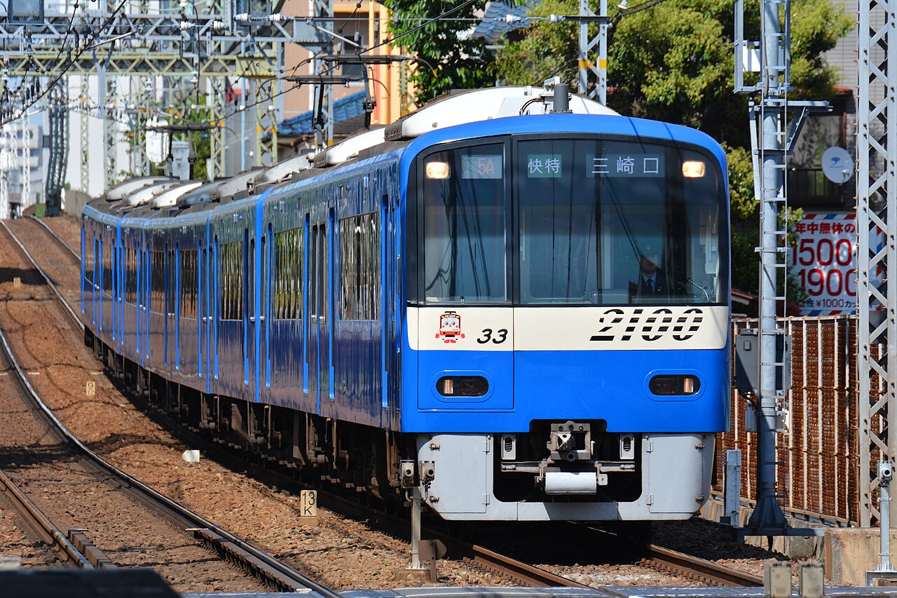 A Keikyū 2100 series in the operator’s signature red livery.
